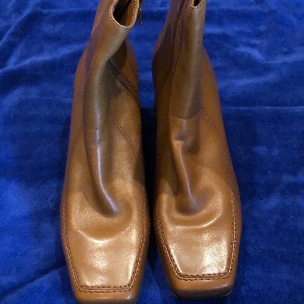 Never worn booties. Great color.